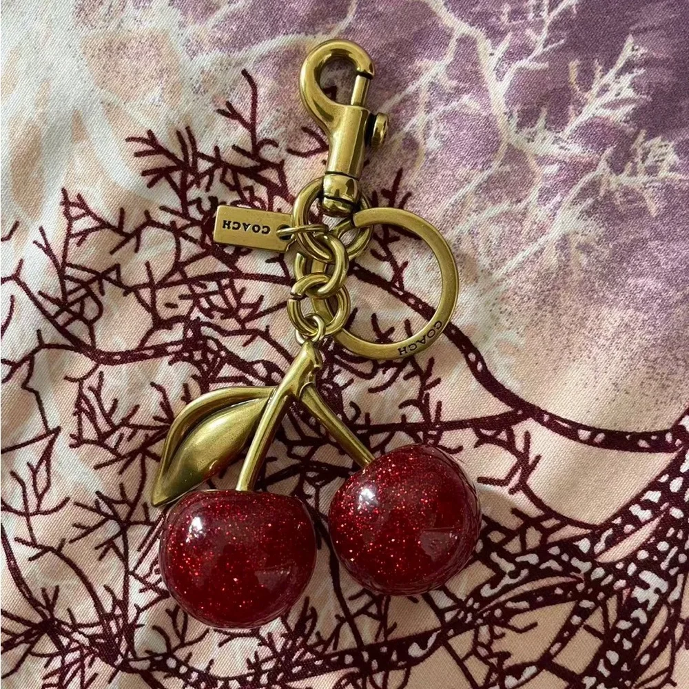 Coach Gold-Tone Red Glitter Cherry Key Charm
